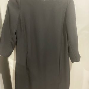 Vince dress black color with leather stripes along the sleeves and the zipper